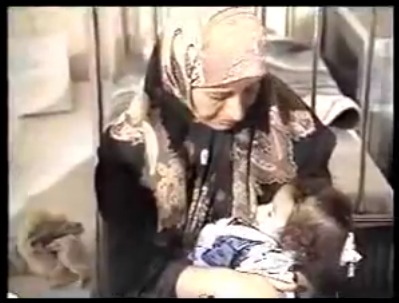 Iraqi woman and child from 1996 60 Minutes broadcast.