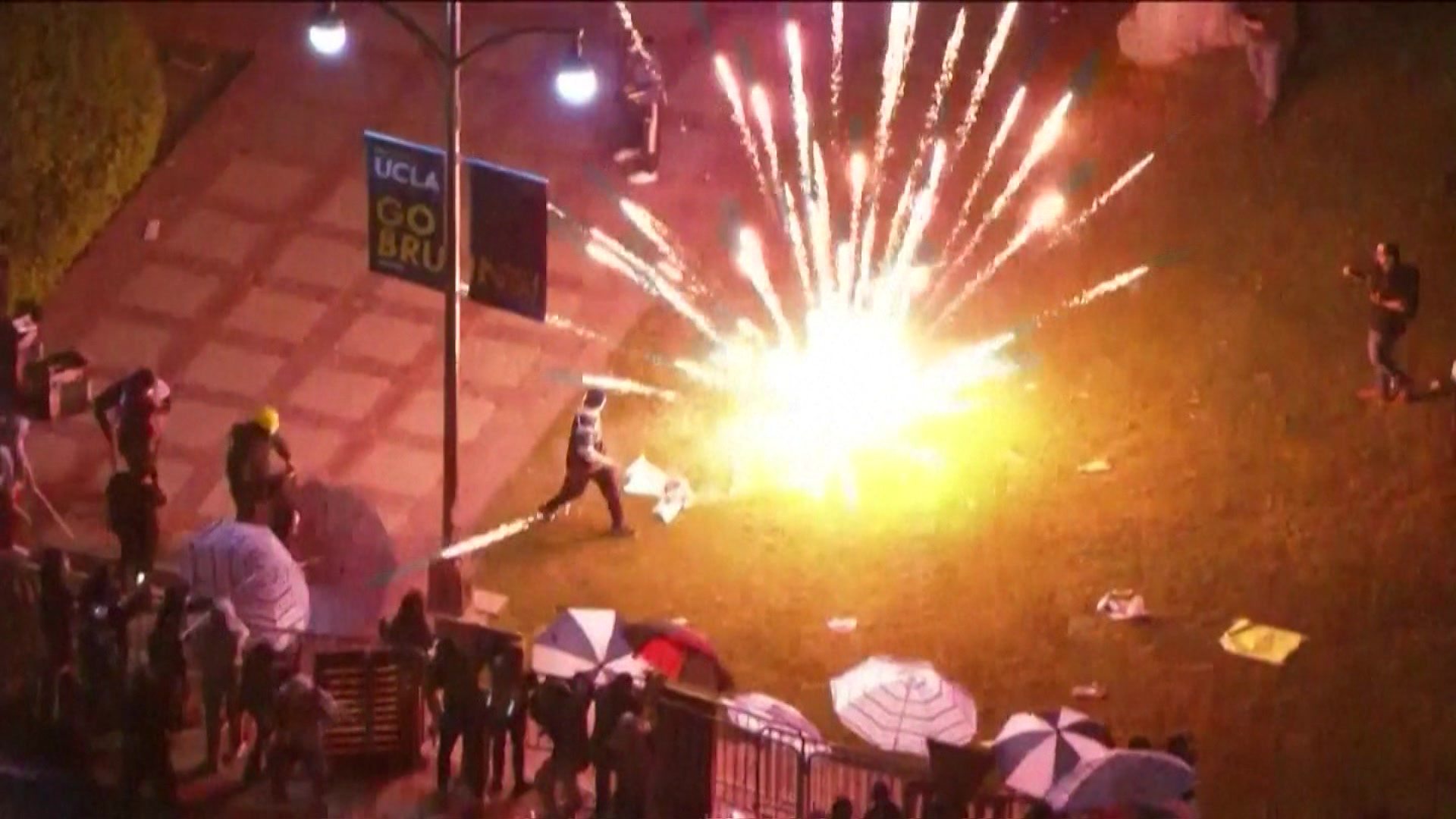 Pro-Israeli thugs attack UCLA protesters camp with clubs, fireworks and pepper spray.