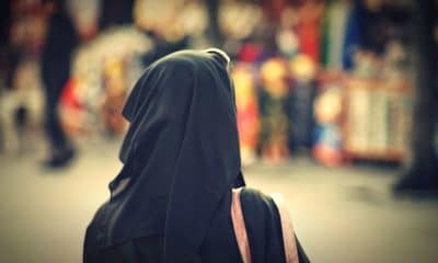Woman in black hijab